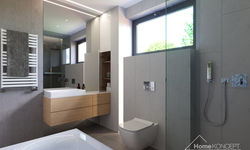 Komfortowo wyposażona łazienka zwraca uwagę aranżacją kolorystyczną - szarość współgra ze szkłem i drewnem